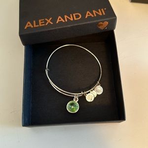 Alex and Ani silver with green stone bracelet.